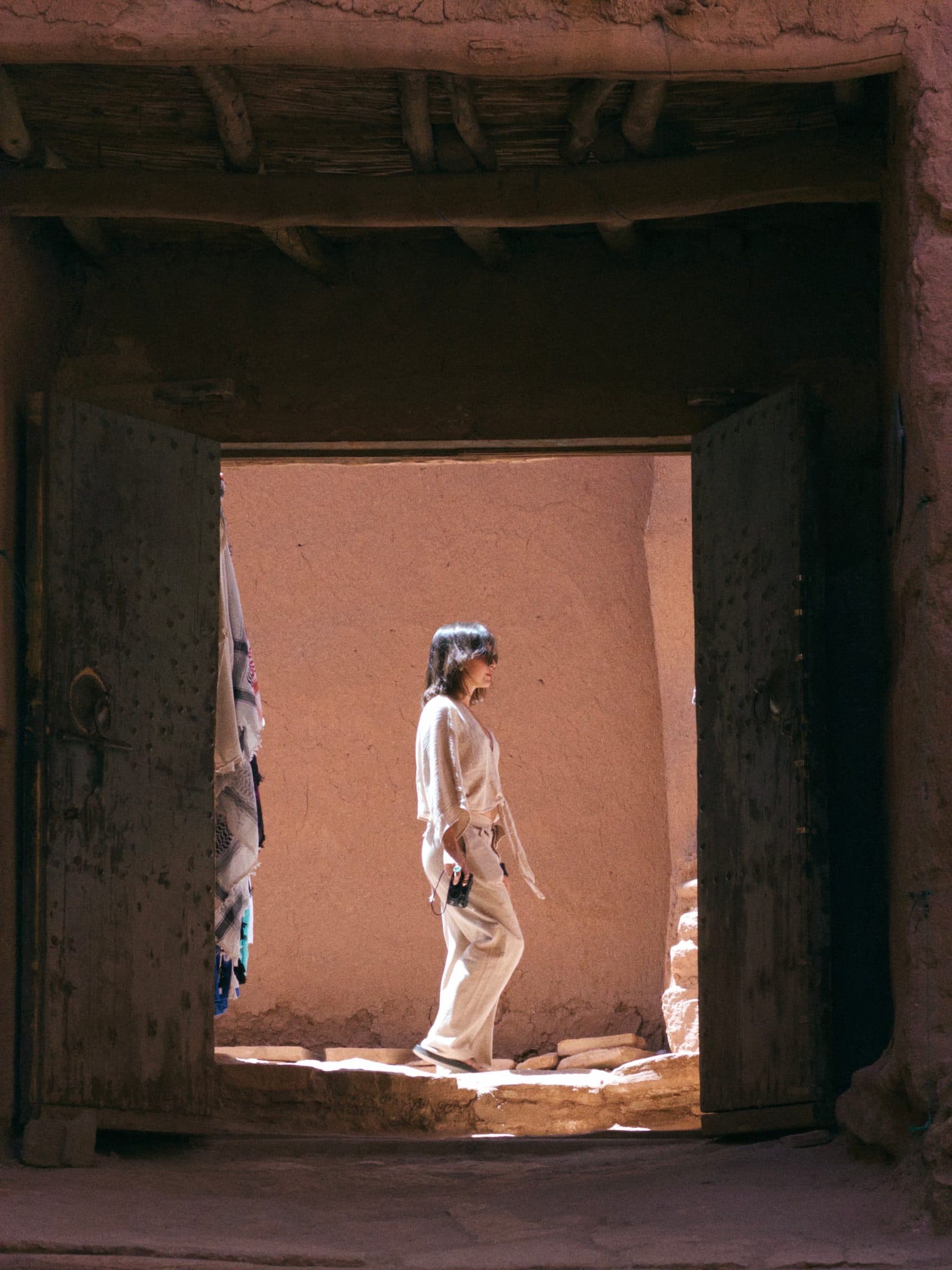 A group of travellers together in the Moroccan desert